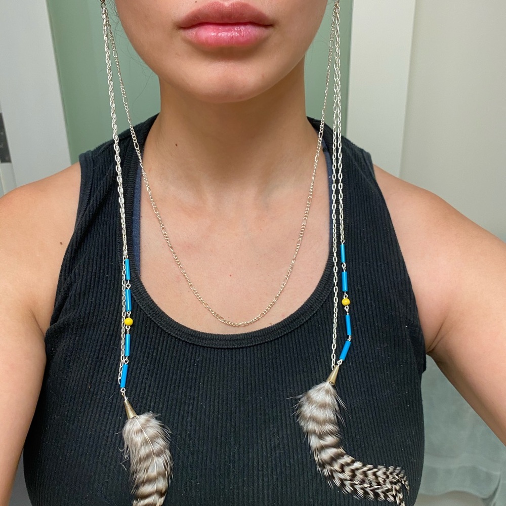 Statement sterling silver and feather earrings